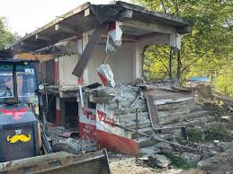 Authorities demolish 15 illegal shops in Anantnag under anti-drug drive