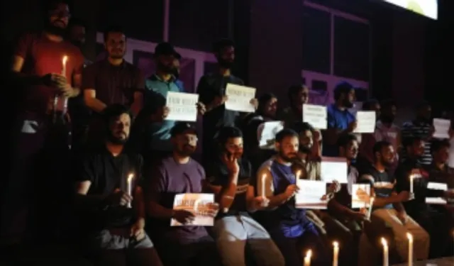GMC Baramulla employees hold candlelight protest over pending promotions