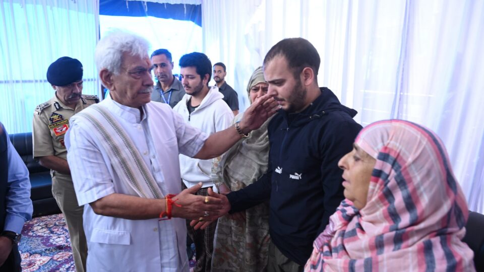LG Sinha visits family of slain policeman